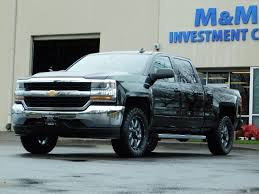 Beautiful black exterior with gray cloth interior. 2017 Chevrolet Silverado 1500 Lt Crew Cab 6 5ft 4wd Lifted Lifted
