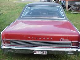 Image result for Antigua Red 1966 AMC