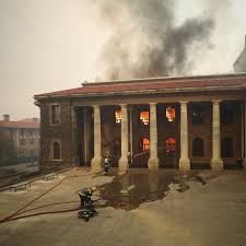Fire fighters tried to prevent a fire from spreading to the university of cape town on sunday after it gutted part of the rhodes memorial restaurant. P0drhxodqn18om