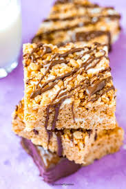 Rice krispie bars with a caramel base, peanut butter, and a chocolate topping! Peanut Butter Rice Krispie Treats With Chocolate Spend With Pennies