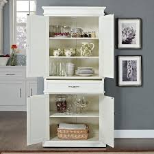 Parsons 33 Wide White 4 Door Kitchen Pantry Cabinet 7g903 Lamps Plus In 2020 White Storage Cabinets Kitchen Pantry Cabinets Pantry Storage