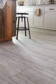 Get the look of natural stone at a fraction of the cost with this 12 in. Style Selections Oyster Travertine 12 In X 24 In Groutable Water Resistant Peel And Stick Luxury Vinyl Tile 2 Sq Ft Lowes Com Luxury Vinyl Tile Vinyl Tile Luxury Vinyl
