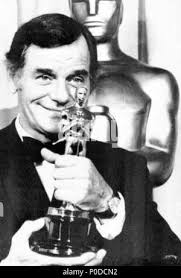 Description: The 42nd Academy Awards (1970) John Wayne winner as best actor  for "True Grit". He is with actress Ann-Margret.. Year: 1970. Stars: JOHN  WAYNE; ANN-MARGRET Stock Photo