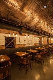 The 10 Best New Restaurants You Ll Want To Visit In Canada Dark Wooden Table Restaurant Restaurant Design