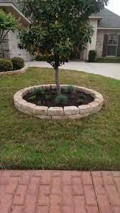 The difference between garden edging and borders. Stone Border Around Flower Beds And Tree Love The Double Layer Of Stone Front Garden Landscape Landscaping Around Trees Mulch Landscaping