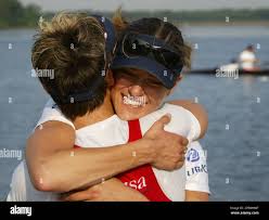 Stacey Borgman, facing camera, of Homer, Ark., and Lisa Schlenker of Lake  Oswego, Ore., representing the Princeton Training Center/New York Athletic  Club, celebrate their a win in the lightweight women's double sculls