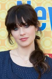 You might also see her with a whimsical flower in her hair. Zooey Deschanel S Hairstyles Hair Colors Steal Her Style