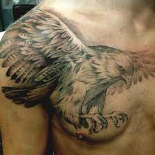 50 Amazing Perfectly Place Eagle Tattoos Designs With Meaning Eagle Tattoos Eagle Tattoo Bald Eagle Tattoos