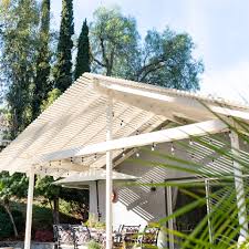 This outdoor canopy looks like a stunning pieces of modern art, don't you think? 15 Shade Ideas For Your Outdoor Space
