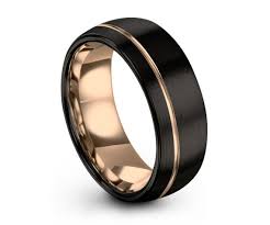 We regard tungsten carbide at mens wedding bands as the ring of the future in that it is virtually scratch resistant, has a dynamic, lustrous shine that is almost permanent, is priced right, and can be etched, or filled with gold inlay or even genuine stones such as firey diamonds! Mens Wedding Band Black Rose Gold Wedding Ring Tungsten Ring Etsy