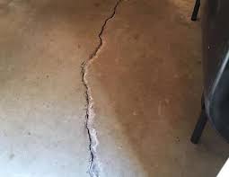 What is the best available option to level the concrete floor before my basement is dry & my contractor is recommending 5.5 mm plywood underlayment glued directly on to the concrete floor. Causes Of Basement Floor Cracks And What To Do About Them News And Events For Basement Systems Inc