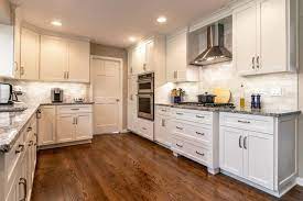 Staining your kitchen cabinets adds color, without losing the character of the wood beneath. Staining And Painting Kitchen Cabinets Reliable Home Improvement