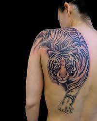 The darker colors used for the tiger's body, and stripes, let the bright a beautiful full size back piece, this tattoo ensures that the patient tiger is always watching your back. 150 Tiger Tattoo Designs That Will Blow Your Mind Away