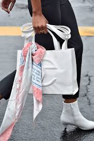 A telfar bag boasts a classic rectangular open tote style with a subtle embossed logo on the front. Scoop Up A Telfar Shopping Bag The It Bag Of The Year Before It Sells Out Again Vogue