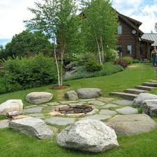 Boulder retaining walls need proper drainage of landscape rock and drain tile behind them to prevent the wall from failing. 75 Beautiful Rustic Landscaping With A Fire Pit Pictures Ideas July 2021 Houzz