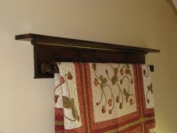 Dave's wood goods creates custom wall mounted quilt hangers with shelves from solid red oak wood for blankets and quilts. Wall Hanging Quilt Rack And Shelf By Doug Wilson Lumberjocks Com Woodworking Community