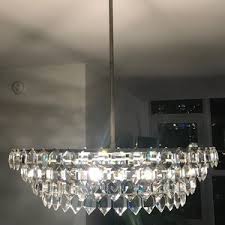 The tiered shape and faceted crystals reflect and distribute light to create a brilliant, beautiful glow. Pottery Barn Other Brand New Pottery Barn Alma Crystal Chandelier Poshmark