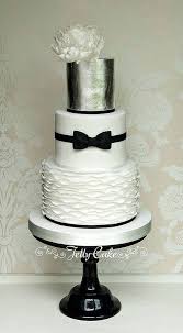 Black And White Bow Tie Cake Bow Tie And Ruffles Anniversary Cake Tall Wedding Cakes Ruffle Cake Beautiful Wedding Cakes