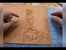 How to carve a basic floral pattern in leather. Introduction To Floral Carving Adding A Bevel To Your Leather Carving Youtube