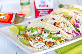 Let everyone assemble their own tacos. Roasted Salmon Tacos With Cilantro Lime Crema