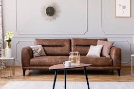 Brown couches are remarkably versatile when it comes to throw pillow colors. Brown Living Rooms That Prove It S A Pretty Hue