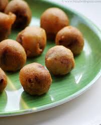 Kobbari Poornam Boorelu Recipe Andhra Coconut Poornalu Recipe Recipe Recipes Organic Recipes Snacks