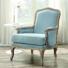 Textured light blue upholstery and a pecan finish on the tapered wood legs gives this lounge chair a warm contrast and alluring appeal. Elements International Accent Chairs Artesia Uaz547100g Arm Chair Midtown Light Blue Stationary From Cooper S Furniture Showcase