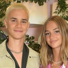 Romeo Beckham with girlfriend Mia Regan in the stands