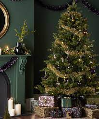 How to put tinsel garland on a christmas tree. Decorating With Tinsel Is Set To Be A Huge Trend This Christmas