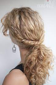 Prepping your curly hair for ponytail looks can really help you maintain it throughout the day. Curly Hairstyle Tutorial The Twist Over Ponytail Hair Romance