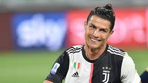 I'm not a robot, i read all comments ! Cristiano Ronaldo Reveals Hair Makeover Long Curly Locks Hollywood Life