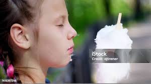 Eating Cotton Candy Stock Photo