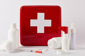 There is a wide variation in the contents of first aid kits based on the knowledge and experience of those putting it together, the differing first aid requirements of the area where it may be used and variations in legislation or regulation in a given area. First Aid Kit Box With Blank Medical Bottles Syringe And Cotton Swab On White Free Stock Photo And Image