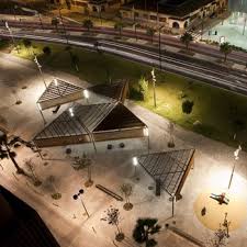 This waterproof fixture has a square frame made of metal with both a matte black and a copper finish. Outdoor Led Lighting Products Iguzzini