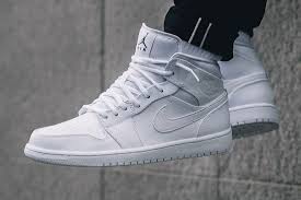 The Air Jordan 1 Mid Goes Triple White Jordan Shoes Girls Sneakers Men Fashion Sneakers Fashion