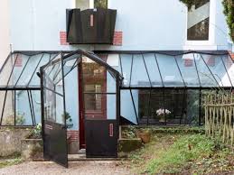 Une Verriere Contemporaine Comme Jardin D Hiver Jardin D Hiver Veranda Veranda Minimaliste