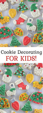 Portrait of happy mother and baby making christmas cookies in chef decorating cookies. Christmas Cookie Decorating For Kids Video Gluesticks Blog