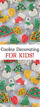 Burning candle in metal flower pot with cookies with fir branches. Christmas Cookie Decorating For Kids Video Gluesticks Blog