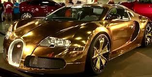 Surely it's like putting a moustache on the mona lisa.' Flo Rida Wraps His Bugatti Veyron In Gold Stuff Co Nz