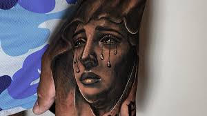 Virgin Crying' Realism Portrait With "LOVE" Lettering Tattoo by Rene  Cristobal.