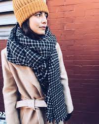 Her camel coat is & other stories, and the other coat she wears, with the red, gray, and black stripes, is isabel marant. Actually Master Of Everything Francesca S Style In Master Of None