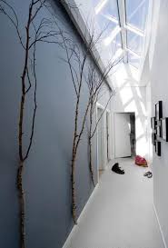 10 Idees Pour Amenager Un Couloir Etroit Blog Deco Clematc Couloir Long Interieur Maison Couloirs Etroits