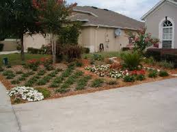 Browse our favorite front yard design ideas to boost curb appeal and create a front yard you'll love. Big Front Yard No Grass Ideas No Grass Front Yard Hardscape Backyard Front Yard Trees For Front Yard