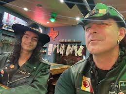 Sweep looking forward to his sausages from our local butcher and enjoying a  glass of wine 😊😊😊😊