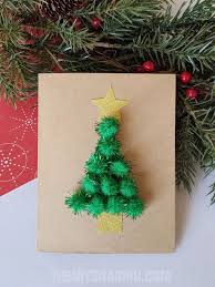 The red cap and pink face are stripes of paper glued onto a card or gift bag. Pom Pom Tree Christmas Card The Joy Of Sharing