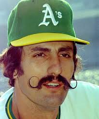 A's pitcher Daniel Mengden's picture from Photo Day today. Thankfully, the  Rollie Fingers Handlebar tribute mustache is back.