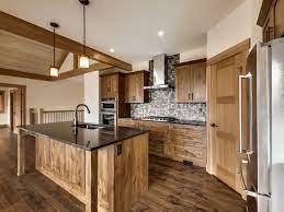 Wood cabinets add instant warmth to a kitchen, creating a space that you will be proud to entertain in. Engineered Hardwood Floors Natural Alder Cabinets Stainless Steel Appliances Slate Tile Timbe Alder Kitchen Cabinets Alder Kitchen Hickory Kitchen Cabinets