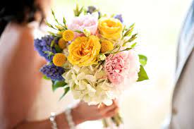 Comboing other blue colors with yellow is a great idea for waterside wedding receptions. Pin By Lauren Deitz On Stuff Yellow Wedding Flowers Yellow Wedding Bouquet Blue Wedding Bouquet