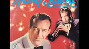 His name was Tommy Sims. He played trumpet. You never heard of him.