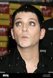 Brian molko and stefan olsdal hi-res stock photography and images